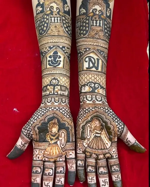 A perfect example of a custom story. This design includes bride and groom portraits, their initials, and a Ganesha motif for blessings, creating a truly personal piece of art for their wedding day.