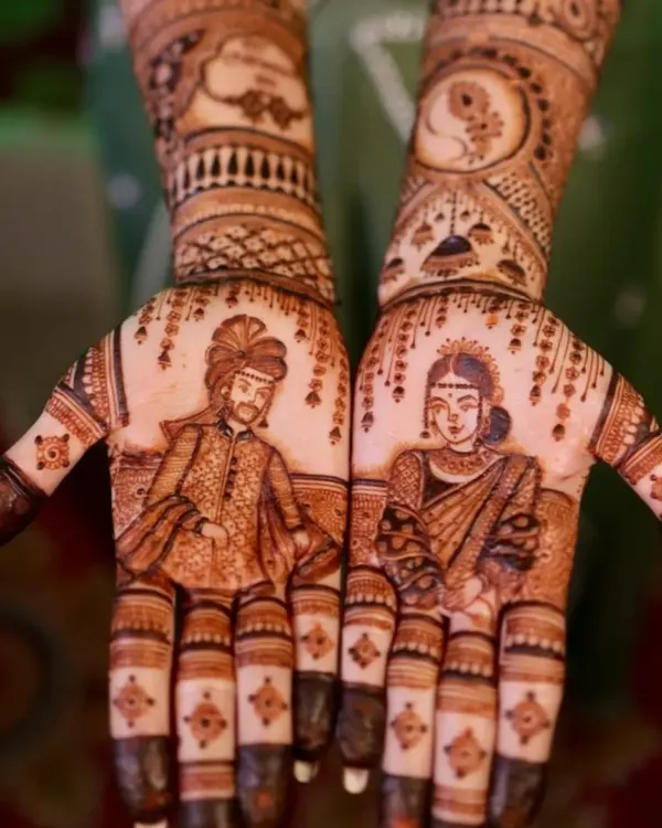 A perfect example of my couple portrait work. I capture the likeness of the bride and groom in traditional wedding attire, making your mehndi truly personal and a centerpiece of your wedding look.