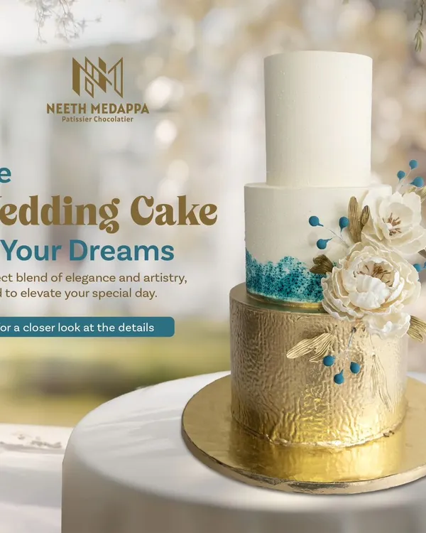 This is the wedding cake of your dreams, a perfect blend of modern elegance and artistry. It features a brushed gold bottom tier, a teal watercolor middle tier, and a clean white top tier, all adorned with handcrafted sugar flowers.