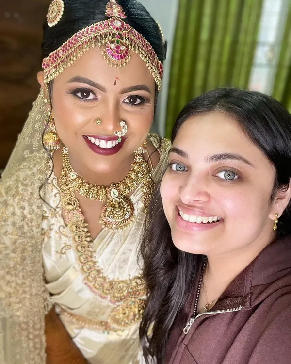 A happy selfie with my own makeup artist for my wedding day. It was a joy to be on the other side of the brush and collaborate on my final look.