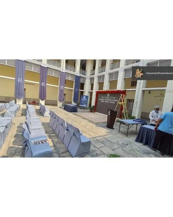 This is the overall setup for the National Law University's annual convocation. We arranged the seating, set up the stage, and placed banners to create a formal and organized environment for the ceremony.