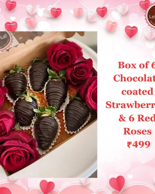 The ultimate romantic gift: a box of six juicy strawberries hand-dipped in rich chocolate, nestled alongside six fresh red roses.