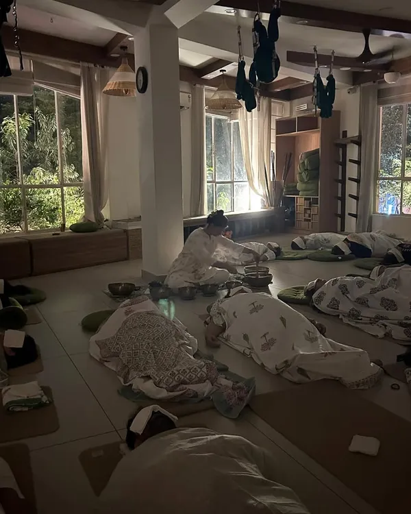 A magical full moon evening of sound healing and EFT tapping. The studio is bathed in soft light as students lie in Savasana, absorbing the healing vibrations and releasing what no longer serves them.