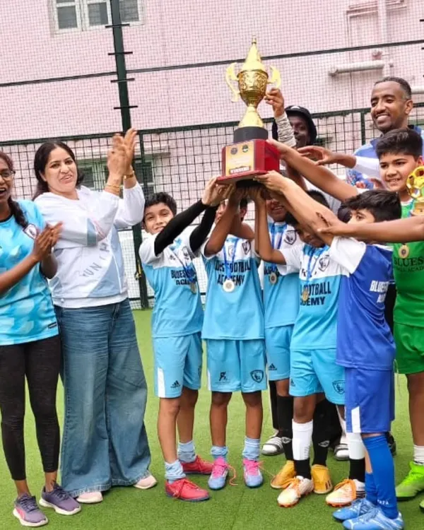 A moment of pure joy as our young champions and their coaches lift the tournament trophy. This is what teamwork, dedication, and community support looks like.
