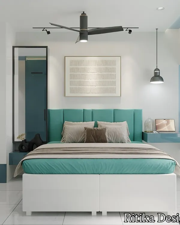 This bedroom design is centered around a refreshing teal and white color scheme. I designed a built-in window seat with storage, creating a cozy reading nook. The floating desk and upholstered headboard make the room feel modern and spacious.