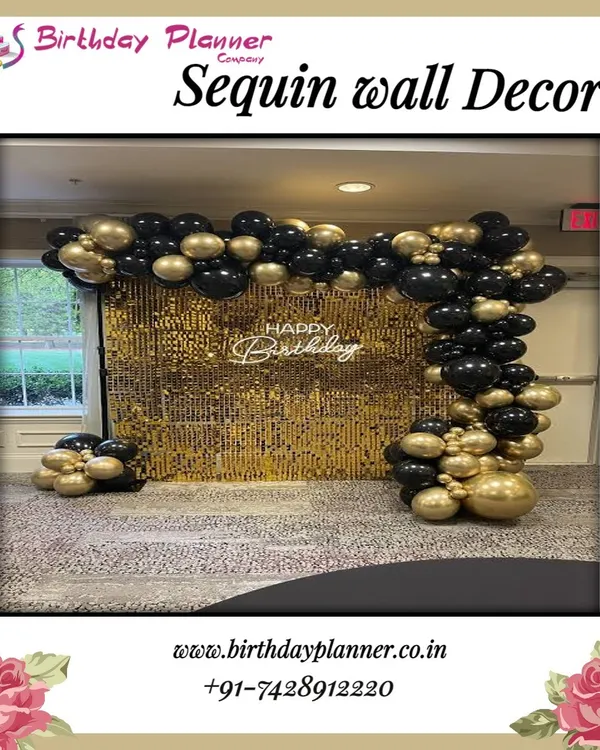 Our sequin wall backdrops are a versatile option for adding glamour to any corporate event. This setup, with its elegant black and gold balloon arch, serves as an excellent photo booth or stage background for company parties and celebrations.