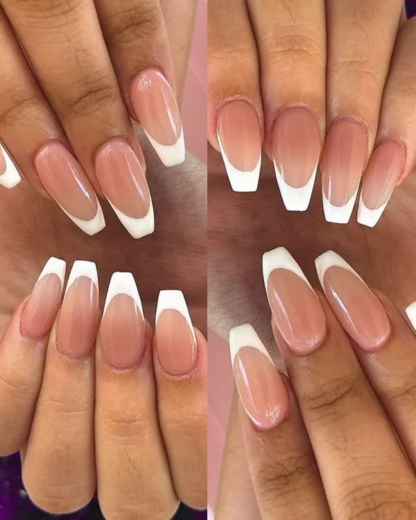 A perfect example of a classic French manicure on long, coffin-shaped acrylic extensions. The clean lines and glossy finish create a look of sophisticated elegance.