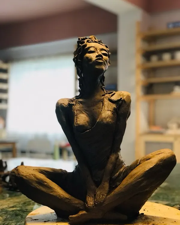 This stunning terracotta sculpture, "Naughty Girl," was brought to life by a student in our workshop. The piece is full of spirit and attitude, from the confident pose to the incredible detail in the hair and muscles.