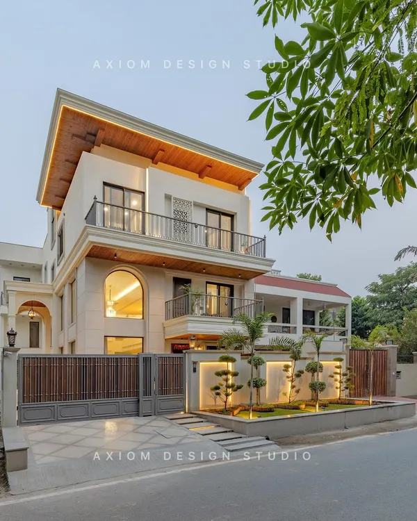 This neoclassical home is a symphony of symmetry and sophistication. We designed it so every detail, from the grand arches to the landscaped entry, whispers tales of timeless craftsmanship and modern luxury.