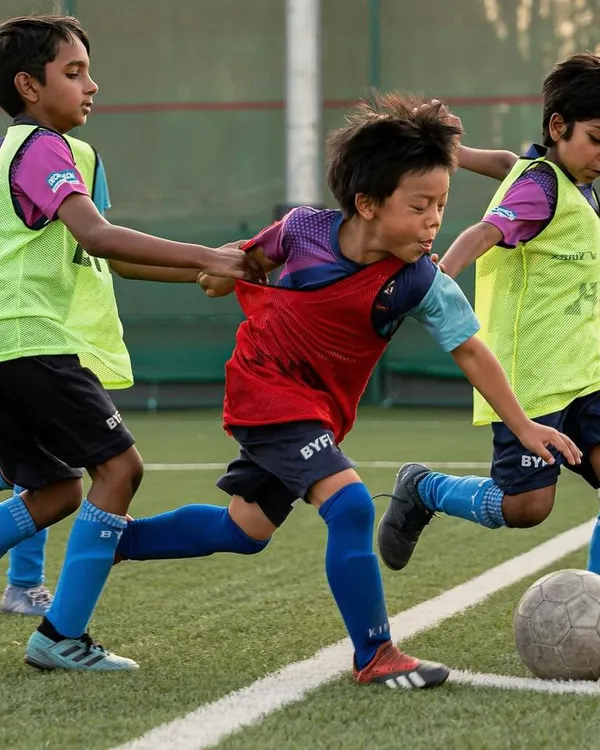 The excitement is real as our young players get into the action. This drill focuses on agility and teamwork, with kids learning to navigate the field together in a fun and competitive spirit.