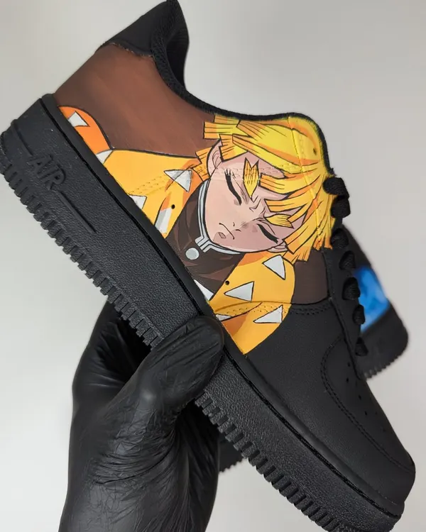 A close-up of Zenitsu from Demon Slayer in his powerful Thunder Breathing First Form. I painted this on a black Air Force 1 to make the yellow and orange pop.