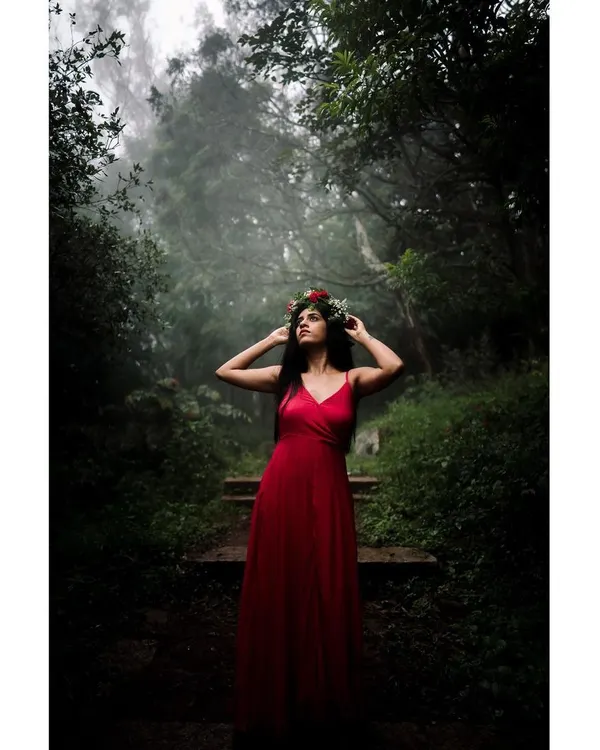 The color version of my misty forest series. The vibrant red dress stands out against the deep greens of the woods, creating a powerful, fairytale-like image that feels both mysterious and beautiful.