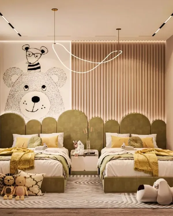 A closer look at our twin bedroom design, showcasing the charming bear wall mural and custom scalloped headboards. The soft color palette and warm lighting create a calming and inviting atmosphere for siblings.