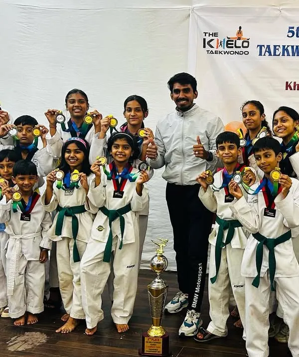 Our team proudly displaying their medals and the 2nd place trophy at the 5th Champions Trophy Championship in 2023. A fantastic team effort.