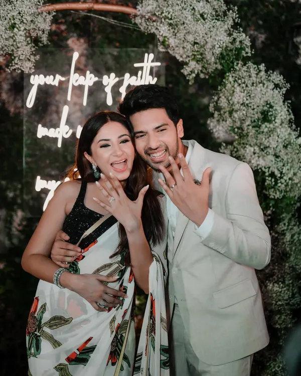 A joyous shot of singer Armaan Malik and influencer Aashna Shroff showing off their rings right after their engagement. It was an honor to capture the start of their forever journey.