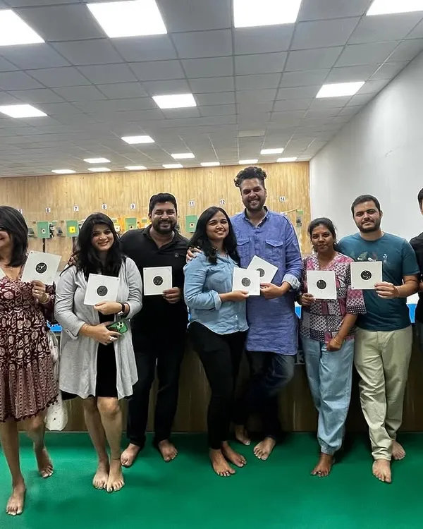 A group of friends and family members celebrate a fun session at our range. It's a great way to bond and create lasting memories together.