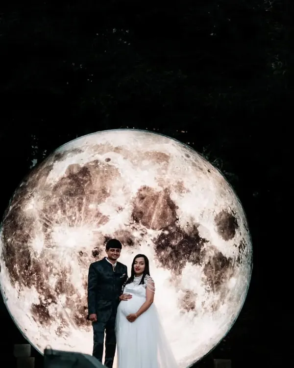 A truly magical outdoor maternity shoot in Bangalore using our popular glowing moon prop. This unique concept creates a dreamy, celestial backdrop to celebrate your journey to motherhood.
