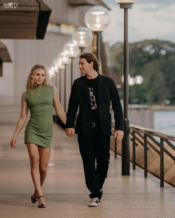 A casual stroll, a shared glance, and the iconic Sydney Opera House in the background. This shot of Chris and Fifi is all about capturing a natural, everyday moment of love in an extraordinary setting.