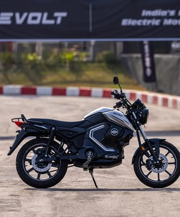 This shot for the launch of the Revolt RV blazeX electric motorcycle captures the bike's sleek design and powerful stance. It's a perfect example of a clean, impactful hero shot for a product launch.
