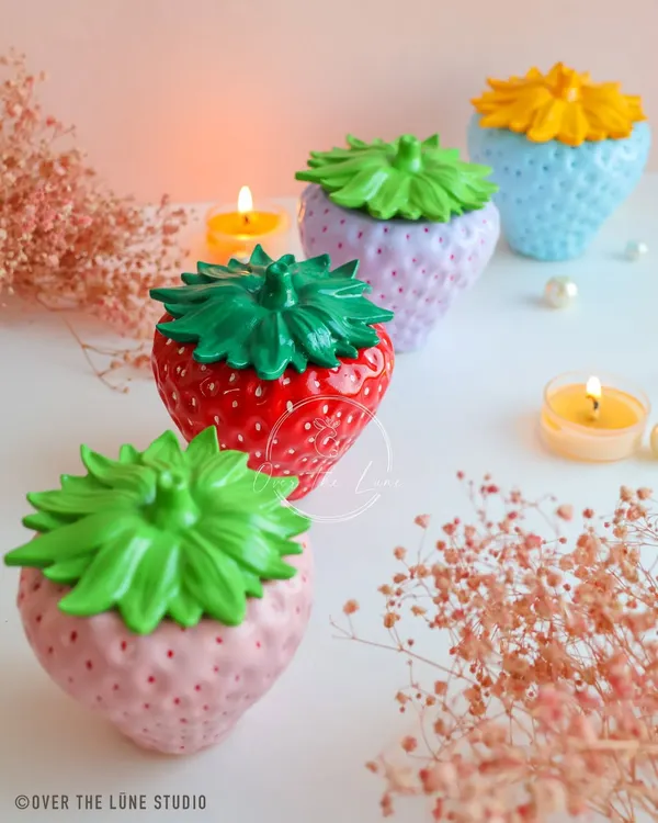This is my hand-painted Strawberry Jar, a piece that brings so much joy! Each one is crafted from eco-resin and given a high-gloss finish, making it a perfect little treasure box for your keepsakes. They come in a variety of cute colors to brighten any shelf.