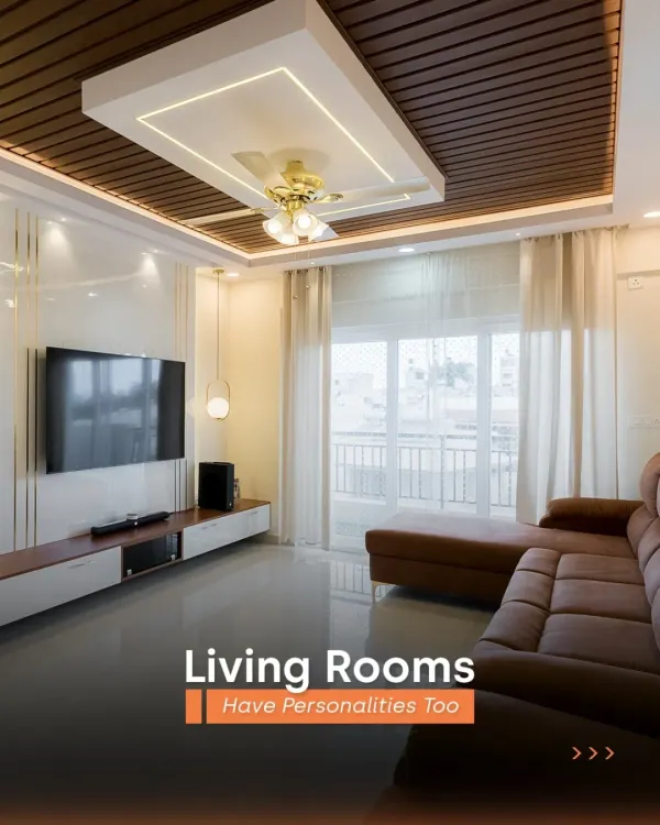 Your living room has a personality, and we help you express it. This bright and airy space features a stunning wooden-paneled false ceiling and a comfortable leather sofa, perfect for a modern, luxurious feel.