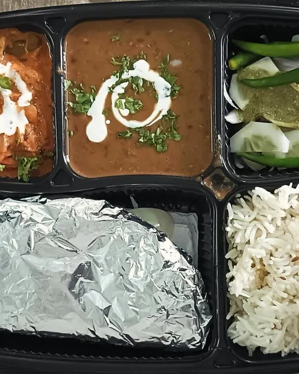 A rich and satisfying thali featuring creamy Dal Makhni and our special Kadai Paneer. This combination is a weekend favorite, packed with flavor and served with rice, roti, and salad.