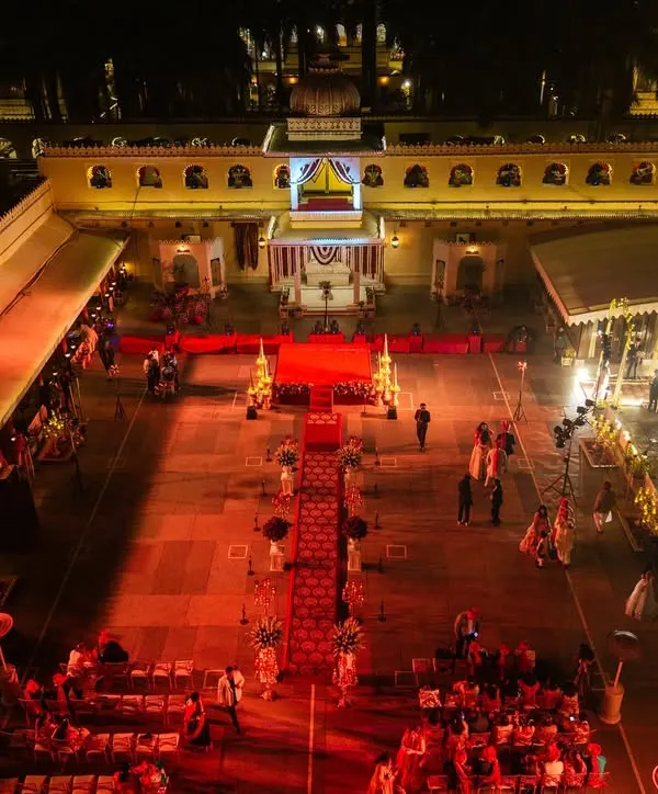 An aerial perspective of a grand wedding setup at Jagmandir Island Palace, showcasing how I utilize the vast courtyards of heritage venues to create a regal atmosphere for your celebrations.