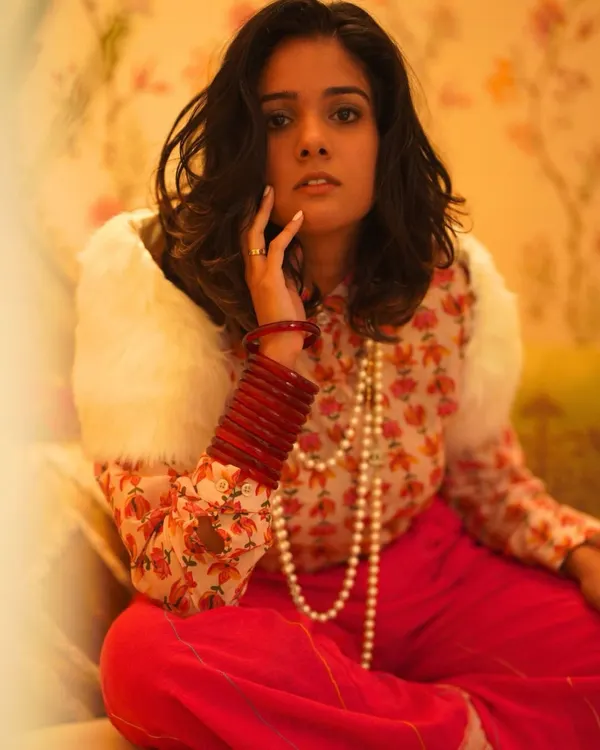 This look is Paris meets Mumbai. I've styled this hand-printed lotus mulmul shirt with rani pink khadi cotton pants. It's all about light, breathable fabrics that feel as good as they look, especially in the summer heat.