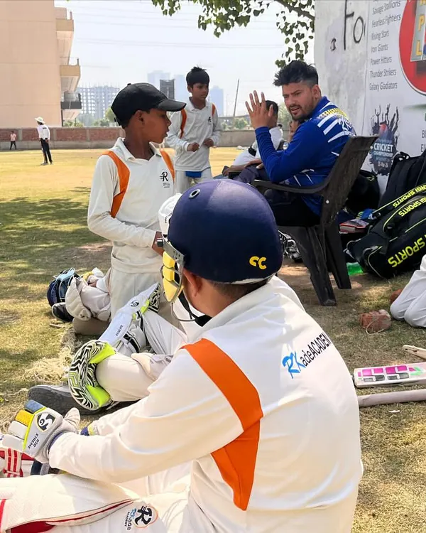 Coaching continues even during the match. Here, one of our coaches provides tactical advice and encouragement to players during a break in an RPL game. These moments of mentorship are crucial for development.
