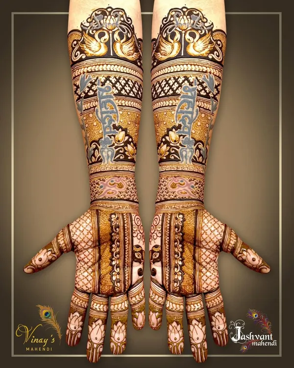 A full-arm symmetrical design featuring swans and elephants, with intricate bands of traditional patterns.