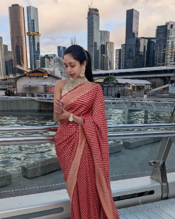 Our client takes her mother's exquisite red Banarasi saree to the streets of Melbourne, proving that tradition is glamorous anywhere in the world.