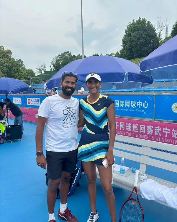 Celebrating a championship win at the W50 Wuning tournament. I am here with our athlete Rutuja Bhosale and her partner Paige Hourigan after they secured the doubles title.