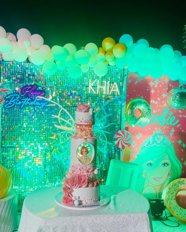 A full view of the 5-tier masterpiece I designed from scratch for a client who wanted something huge, fancy, and pink. This cake features multiple textures, a custom portrait, and a cascade of handmade sugar flowers.