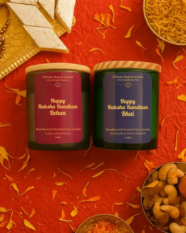 My special Raksha Bandhan collection, featuring 'Happy Raksha Bandhan Behen' and 'Happy Raksha Bandhan Bhai' candles. They are perfect for celebrating this beautiful bond, shown here in a festive setting with traditional sweets.