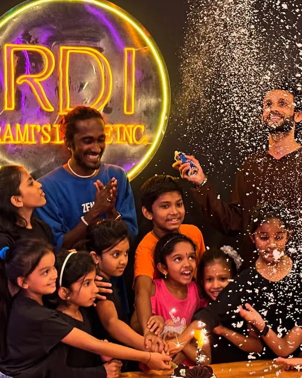 Pure joy and celebration. This moment from our Children's Day party, complete with a snow spray surprise, perfectly captures the fun-loving spirit of our studio. We believe in creating happy memories.