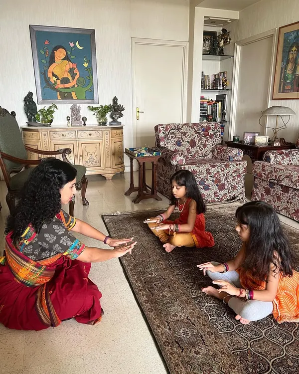 Teaching the foundational 'tattadavu' sitting posture to my youngest students. We focus on correct posture and alignment from the very beginning, ensuring a strong base for their dance education in a gentle and encouraging way.