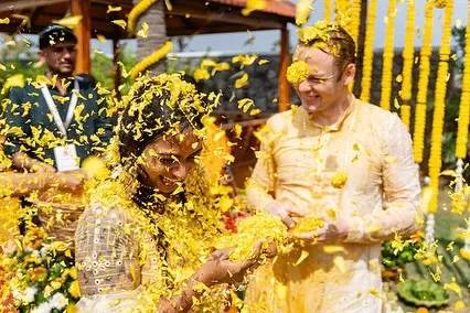 This is the pure, unscripted joy of a phoolon ki holi. I love creating these moments where you can let go and just celebrate. It’s a beautiful, fragrant, and photogenic alternative to a traditional haldi ceremony.
