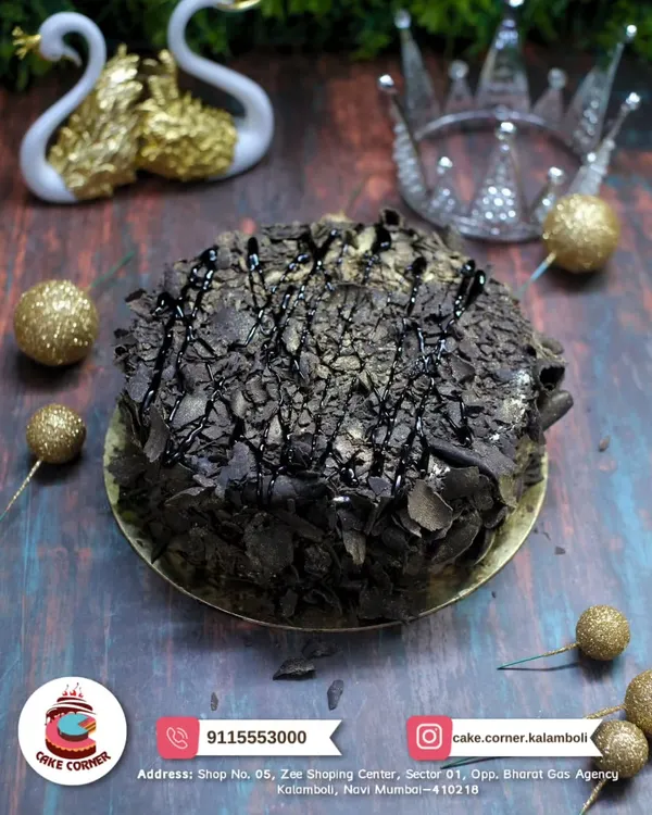 A rich and decadent chocolate overload cake. Covered in chocolate shavings and drizzle, it's a dream come true for any chocolate lover.