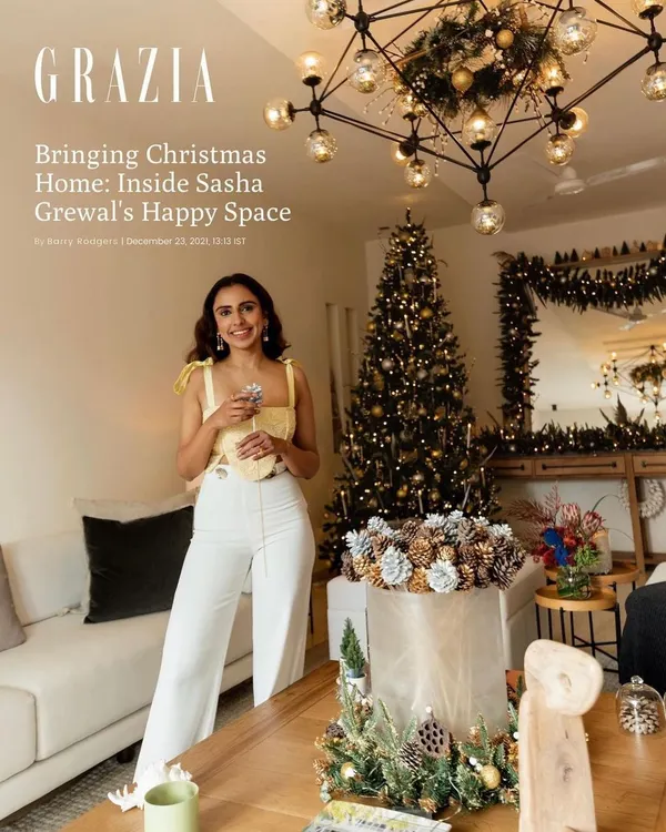 The cover story for Grazia India, featuring Sasha Grewal in her festively decorated home, capturing a warm and happy holiday atmosphere.