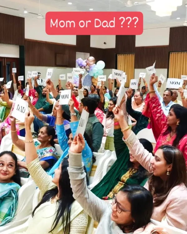 This is one of my favorite moments, the 'Mom vs Dad' game. The entire room gets involved, and the laughter is just infectious. It’s a perfect way to add some modern masti to a traditional baby shower.