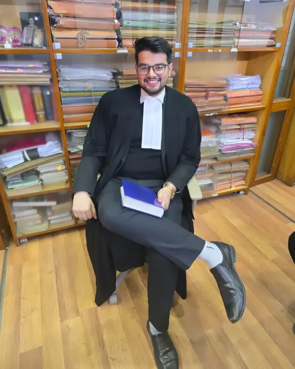 In my chamber, surrounded by the tools of my trade. Courage is the most essential quality for an advocate, allowing me to fearlessly represent my client's case before the court.