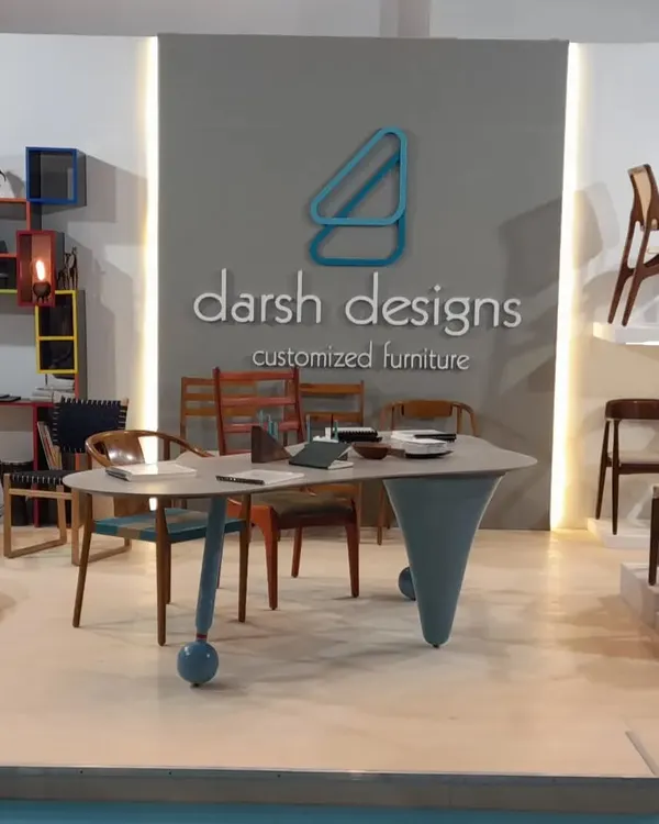 My booth at the iDAC exhibition, ready for visitors. I designed the space to showcase a wide variety of my custom chairs and a unique centerpiece table, giving people a real feel for my design style and manufacturing quality.