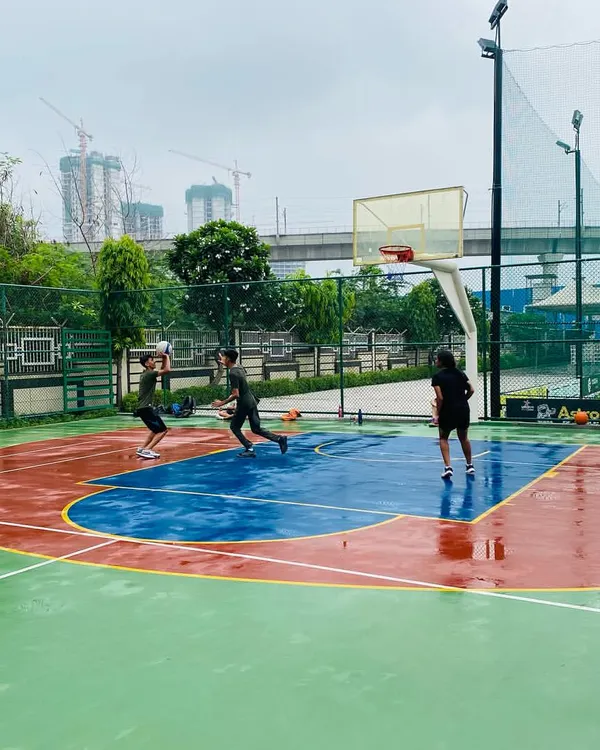 The court is wet, but the energy is high. A little rain can't stop our morning session.