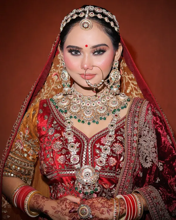 A classic North Indian bridal look created by our student. We focus on achieving that perfect, radiant glow with flawless skin and beautifully defined eyes. So proud of this work.
