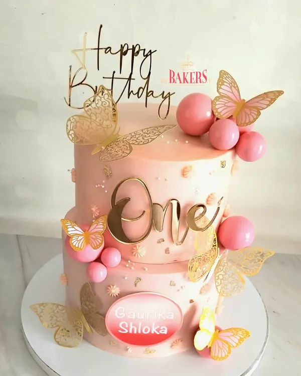 A special cake for a special celebration! This butterfly-themed two-tier cake was made for Gaurika and Shloka’s first birthday. The pink and gold design with delicate butterflies was a complete showstopper.