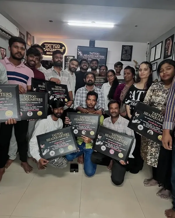 The proud and certified students from our March batch, holding their certificates of completion. This group is ready to take the next step in their tattoo careers.