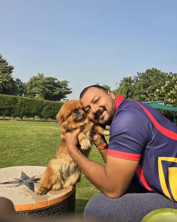 A hug and a cuddle for this sweet Pekingese. These moments of affection are what make our boarding facility a true home away from home.