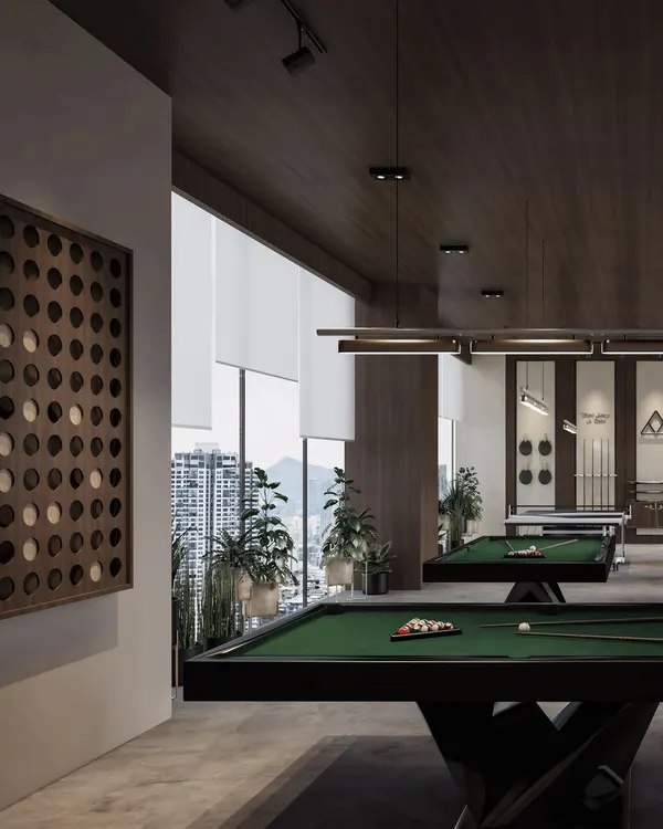 A professional visualization of an indoor games room, featuring sleek pool tables and modern decor. The render captures the sophisticated yet relaxed atmosphere of the space.