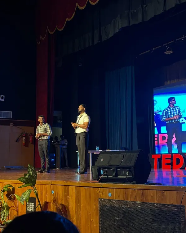 On stage at TEDxSABVMCRI, my fourth TEDx performance. I believe in making core messages stick, and this platform allows me to share my unique blend of mentalism and storytelling with a curious audience.