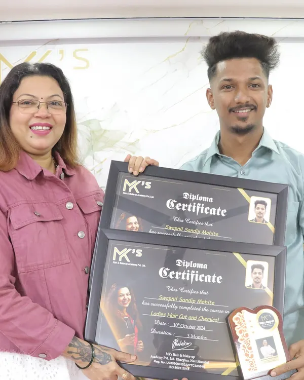 A proud moment, awarding a student with diplomas for successfully completing the Ladies Hair Cut and Chemical courses. It's wonderful to see their dedication turn into professional skills.